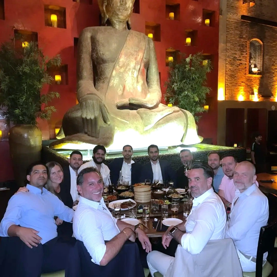 Client dinner discussing growth and partnership